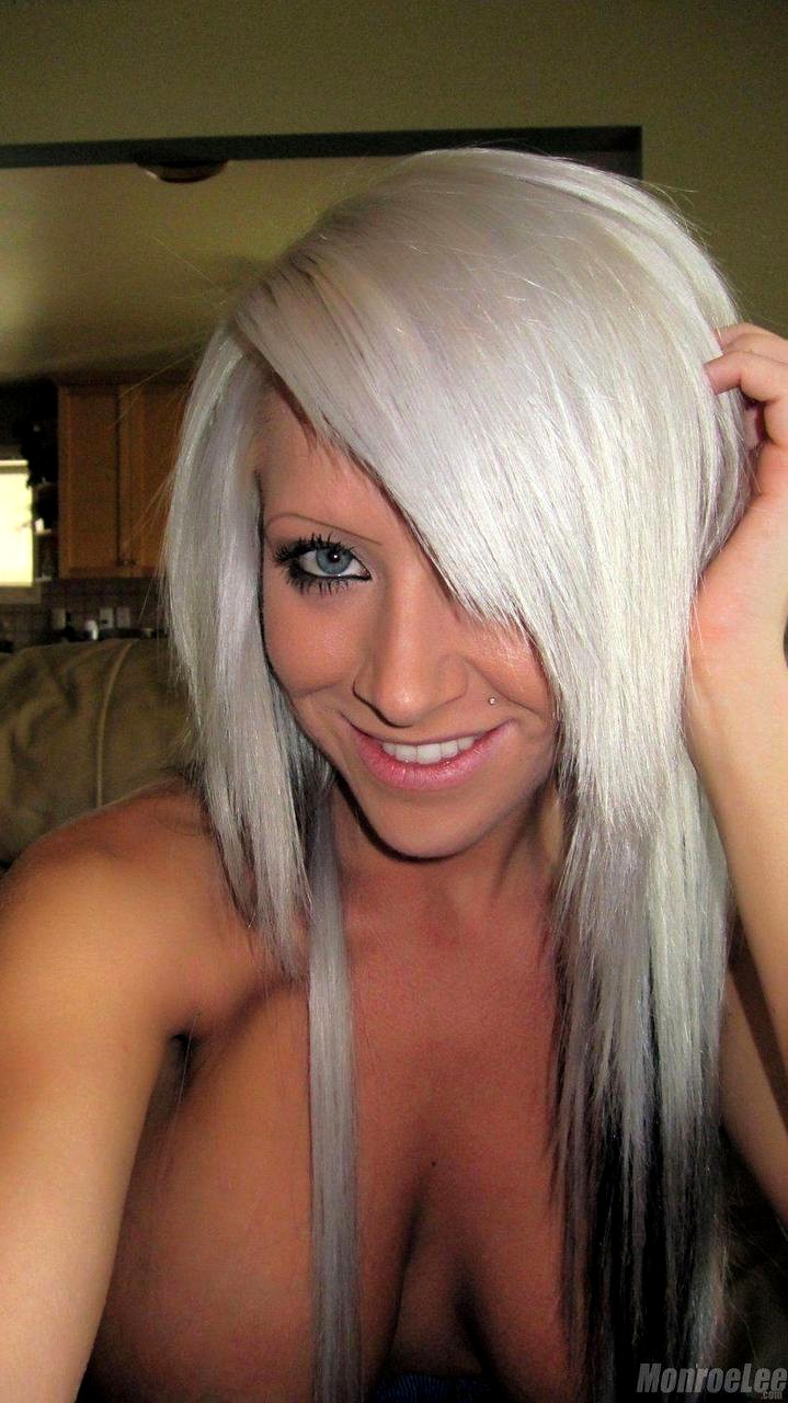 White haired slut Monroe Lee takes a selfie of her big tits and naked twat!...
