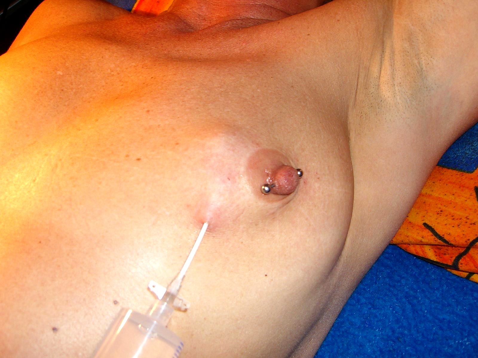 Extreme Male Nipple Piercing.